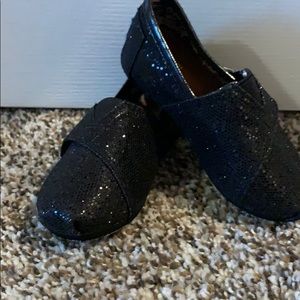 TOMS Black Glitter Slip Ons
